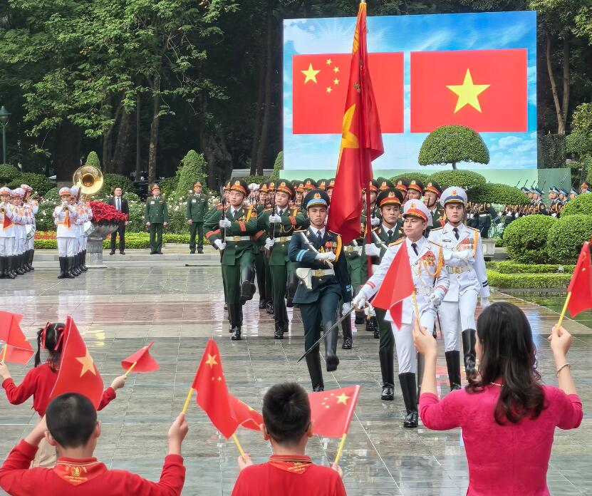 时政快讯丨习近平出席越共中央总书记举行的欢迎仪式