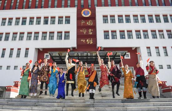 Students perform during an event to celebrate the 70th anniversary of the founding of the People's Republic of China at Tibet University in Lhasa, capital of southwest China's Tibet Autonomous Region, Sept. 12, 2019. (Xinhua/Jigme Dorje)