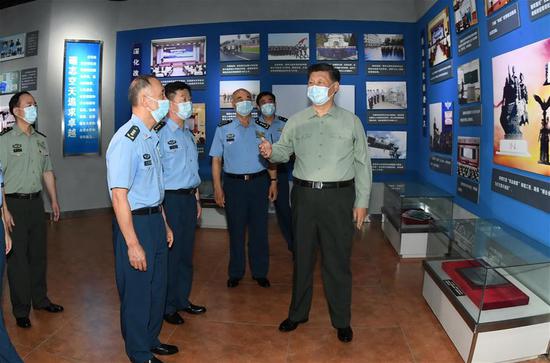 Chinese President Xi Jinping, also general secretary of the Communist Party of China (CPC) Central Committee and chairman of the Central Military Commission (CMC), visits the aviation museum of the Aviation University of the Air Force in northeast China's Jilin Province, July 23, 2020. Xi inspected the Aviation University of the Air Force in Jilin on Thursday, in the run-up to China's Army Day. On behalf of the CPC Central Committee and the CMC, Xi extended Army Day greetings to the personnel of the People's Liberation Army (PLA), the Armed Police Force, the militia, and the reserve force. China's Army Day falls on Aug. 1. (Xinhua/Li Gang)